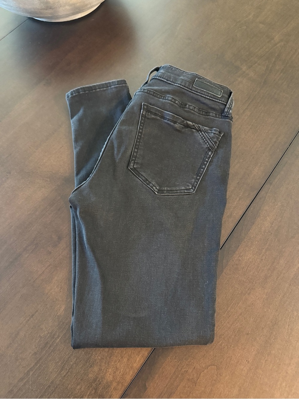Women’s Faded Black Buckle Black Skinny Jeans